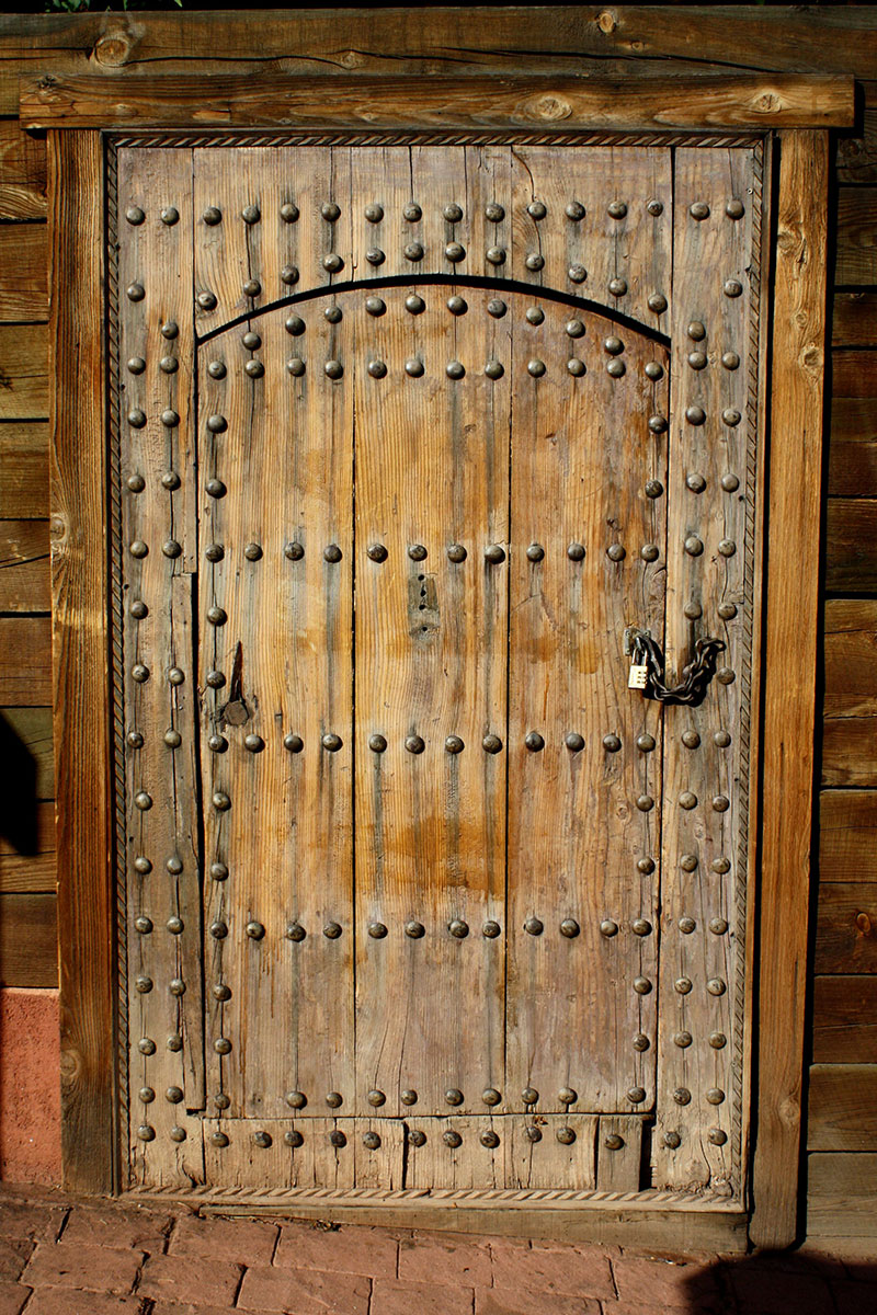 Old-World-Rustic-Wooden-Door-with-Bolts-and-Padlock-Doors-tell-a-story Rustic background images to download for your designs