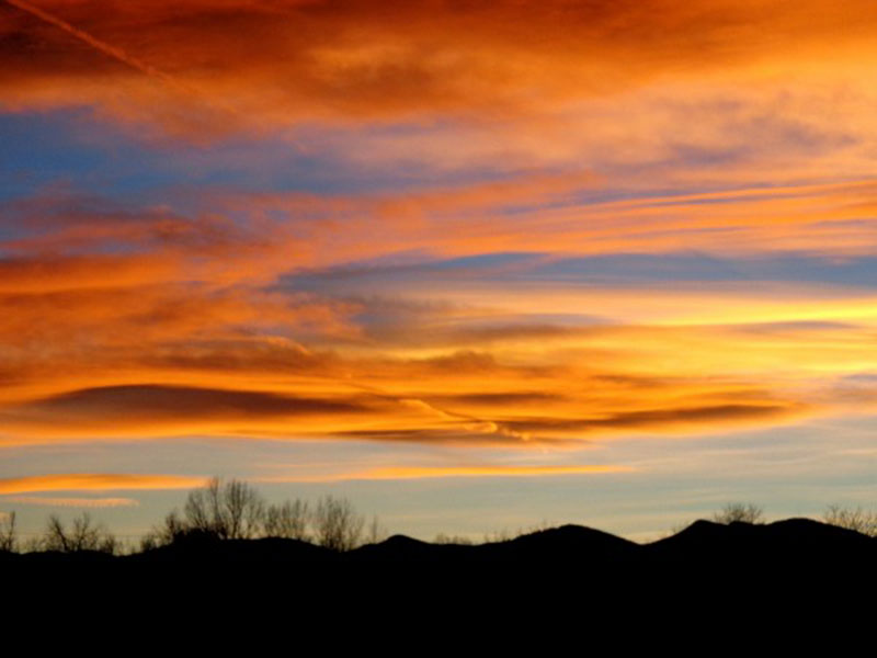 Orange-and-Blue-Sunset-over-Rolling-Hills Check out these free sunset background images