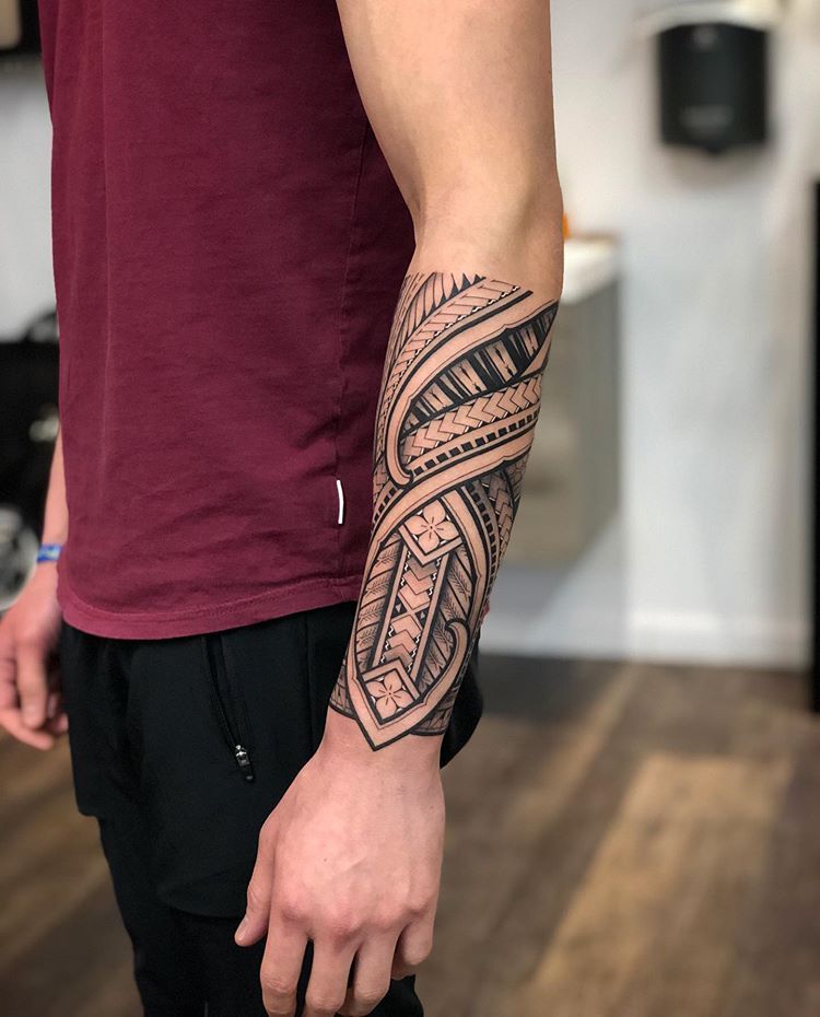 traditional polynesian tattoo modern lower arm tattoo